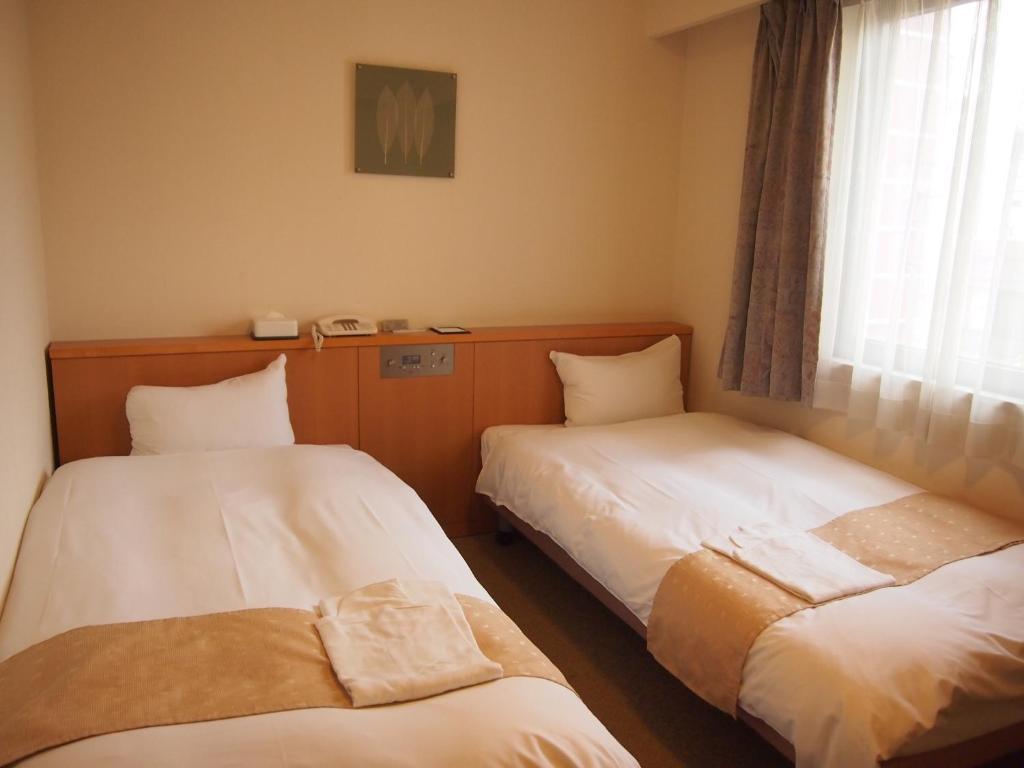 Nest Hotel Kumamoto Værelse billede