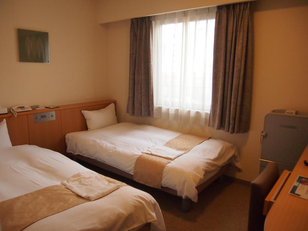 Nest Hotel Kumamoto Værelse billede